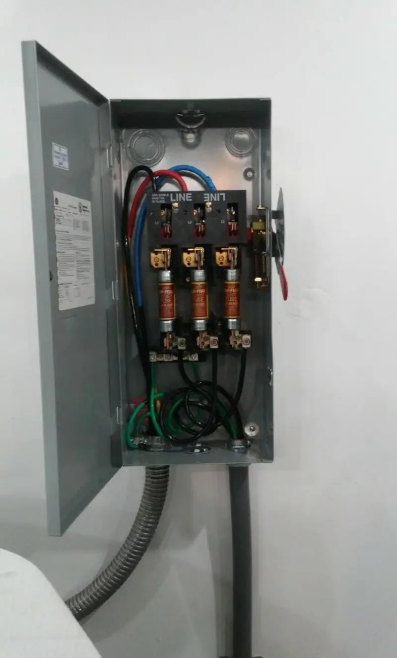 Three-phase disconnect switch installed for Smoke Detector Installation in Corydon