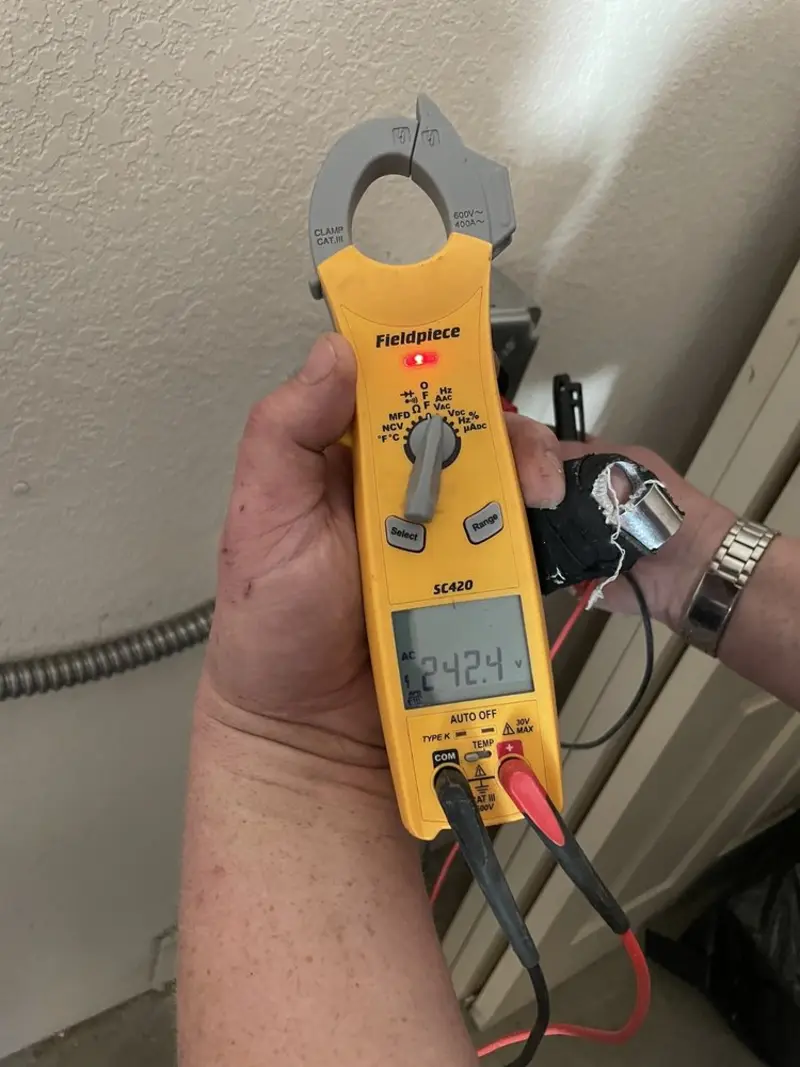 Voltage testing with clamp meter during Aluminum Wiring Replacement in Corydon